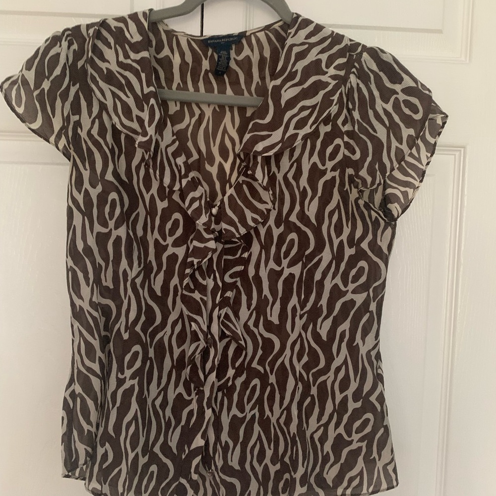 Zebra print silk blouse.